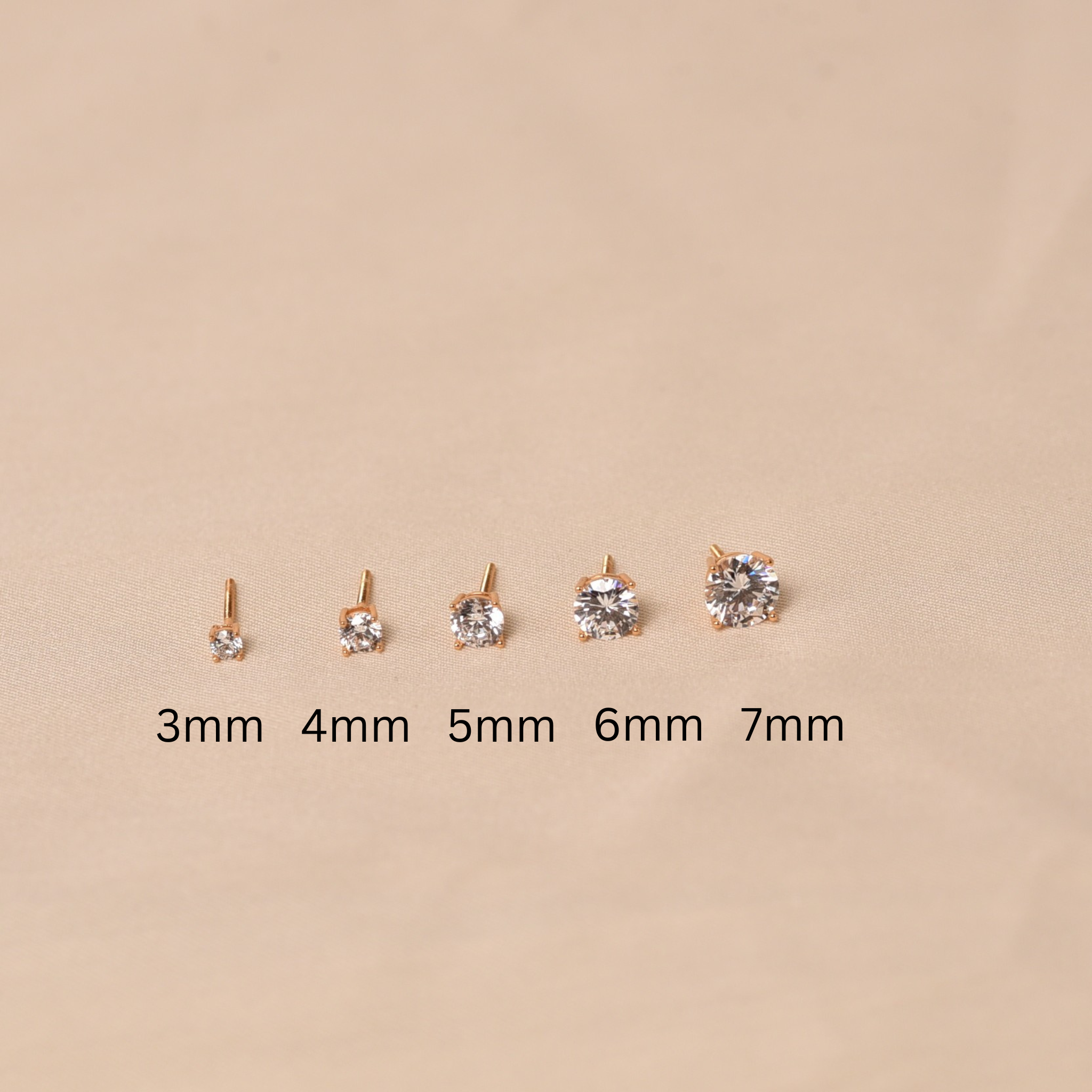 4 Prong Solitaire Stud - 7mm Gold