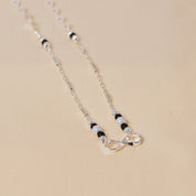 Infinity design Mangalsutra with black beads in SIlver for Women by Elyta