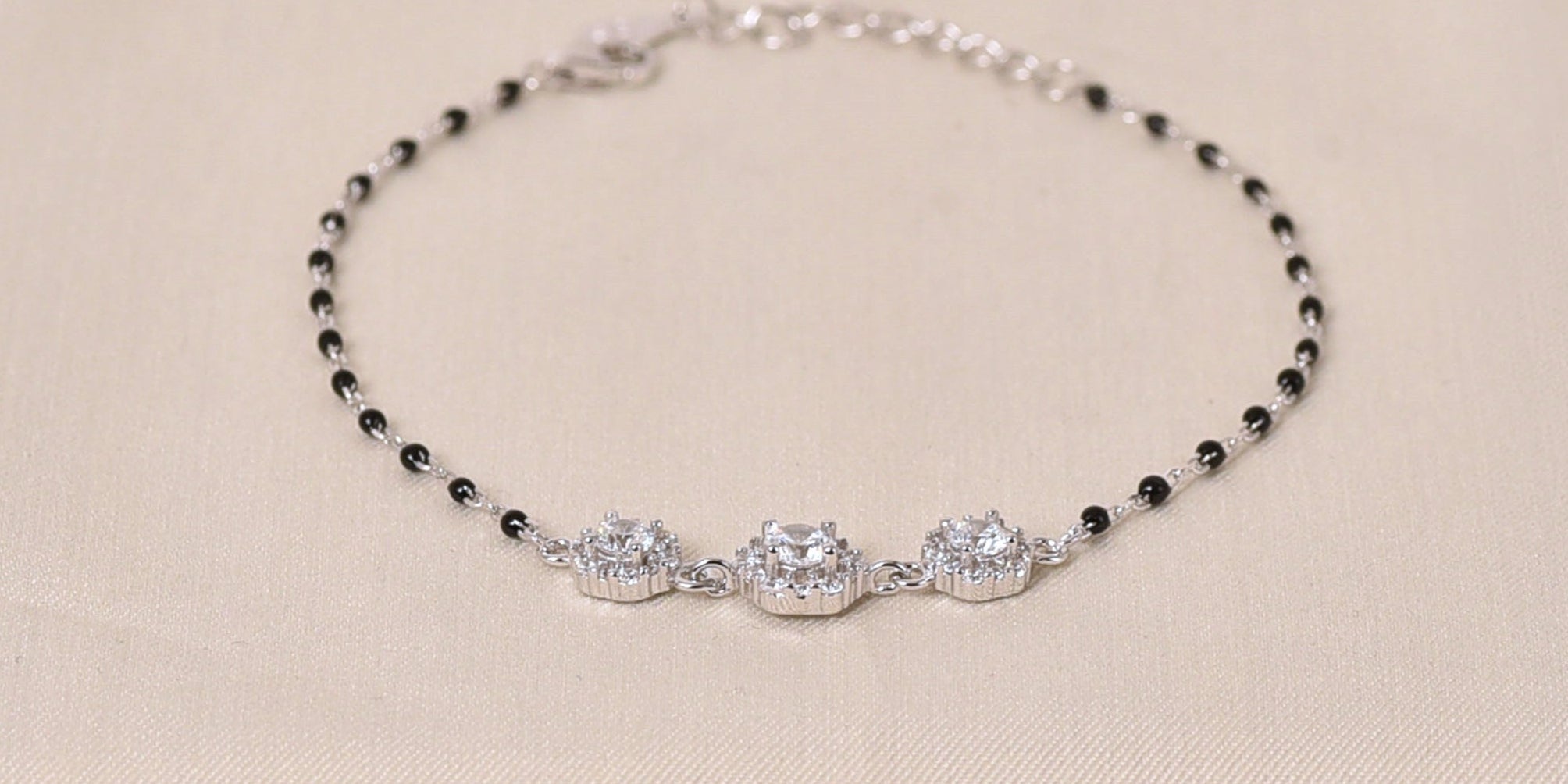 925 Silver Mangalsutra bracelet with black beads and clear stones with clasp lock