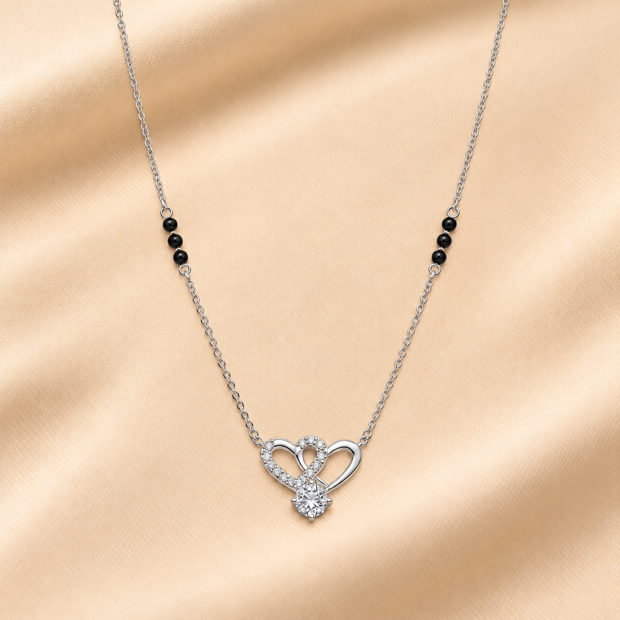 Diamond_Double-Heart_Necklace_on_Satin.png