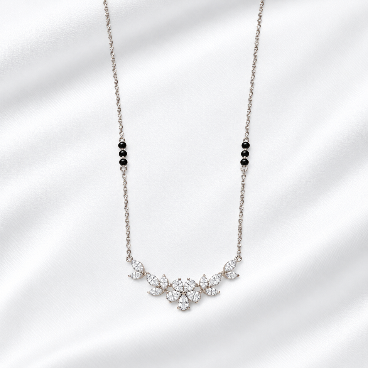 Diamond_Mangalsutra_on_White_Satin.png