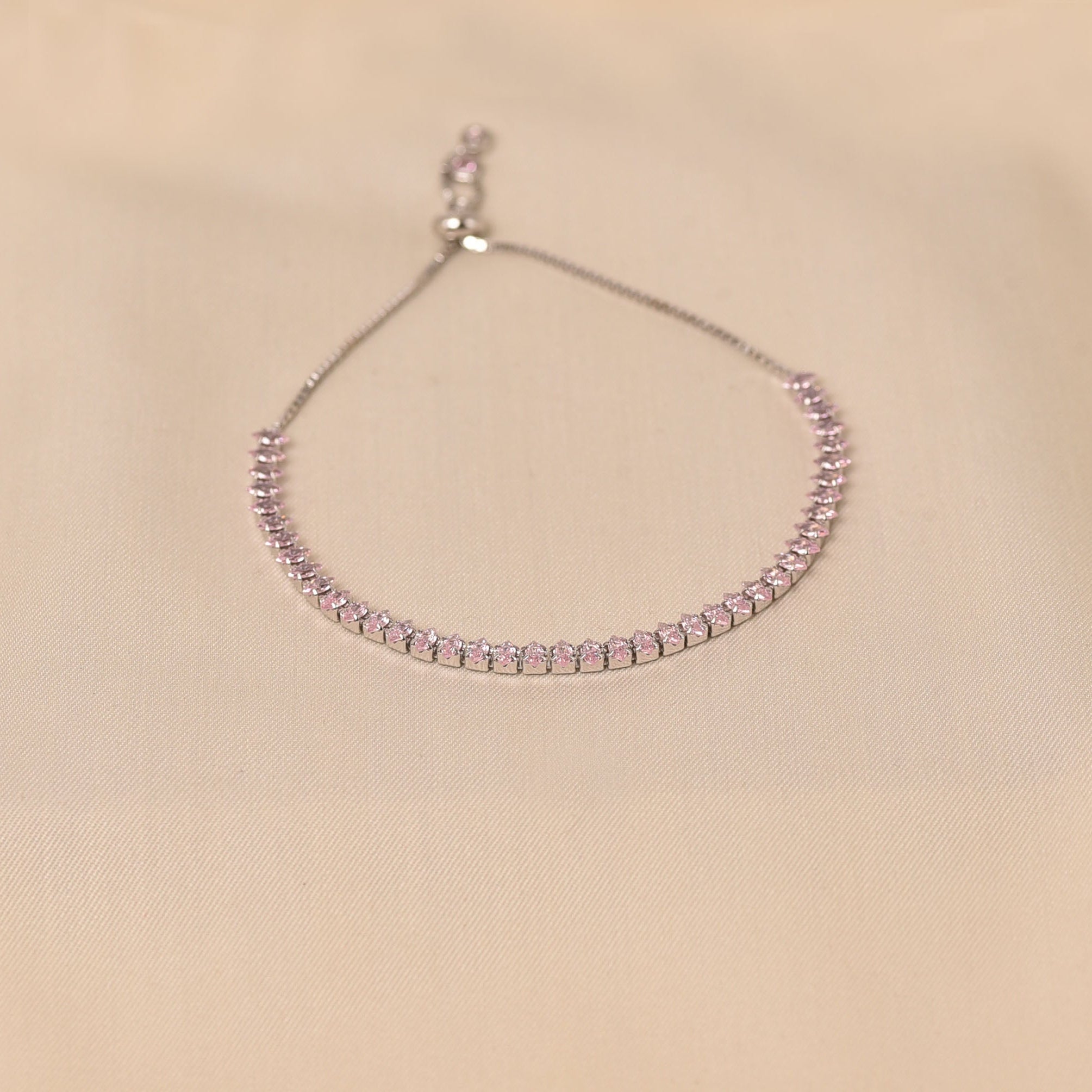 Free Size light pink tennis bracelet of her