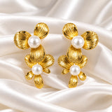 Golden Petal Pearl Statement Studs