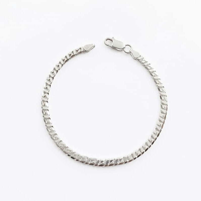 Silver bracelet on a white background