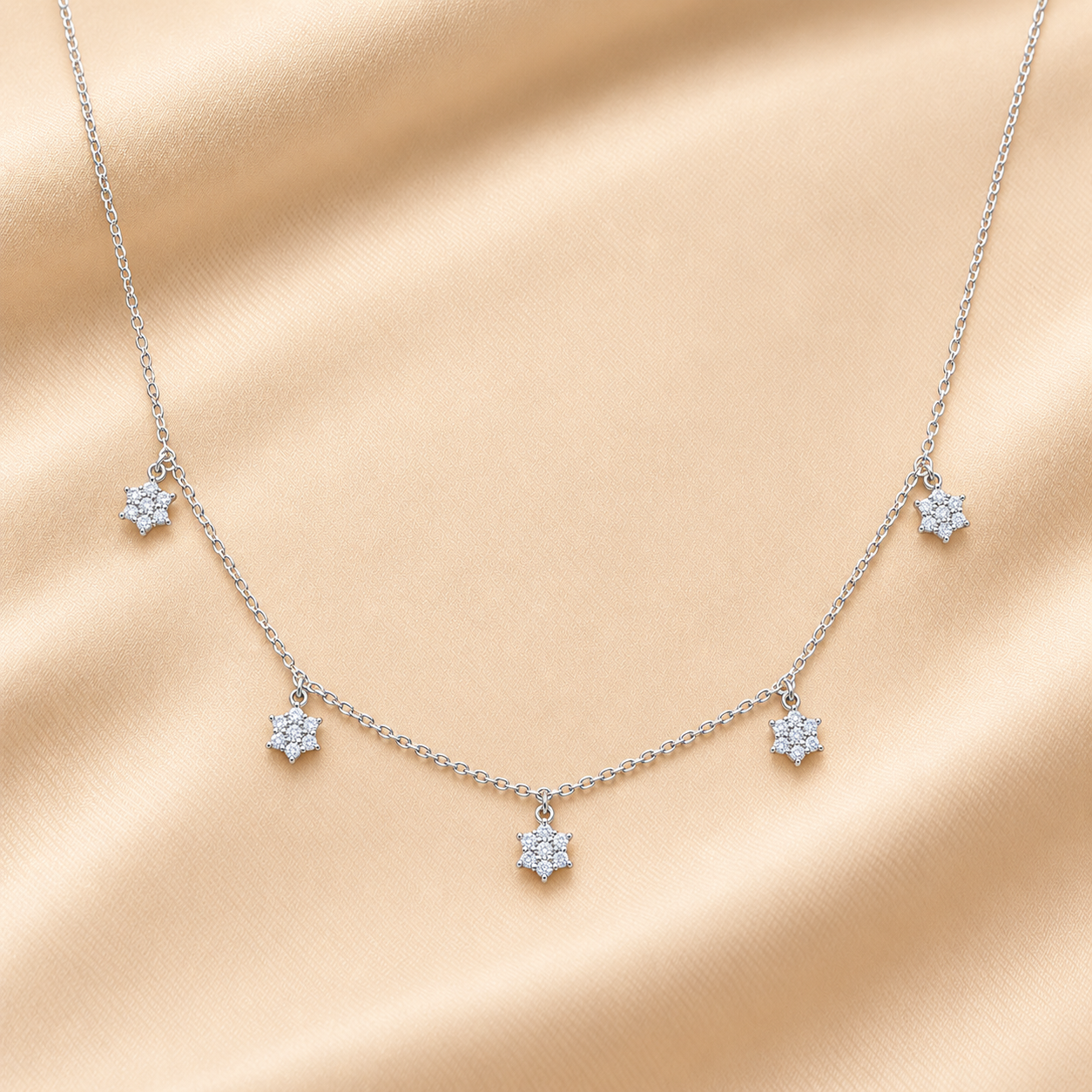 Pave_Star_Charm_Necklace_on_Silk.png