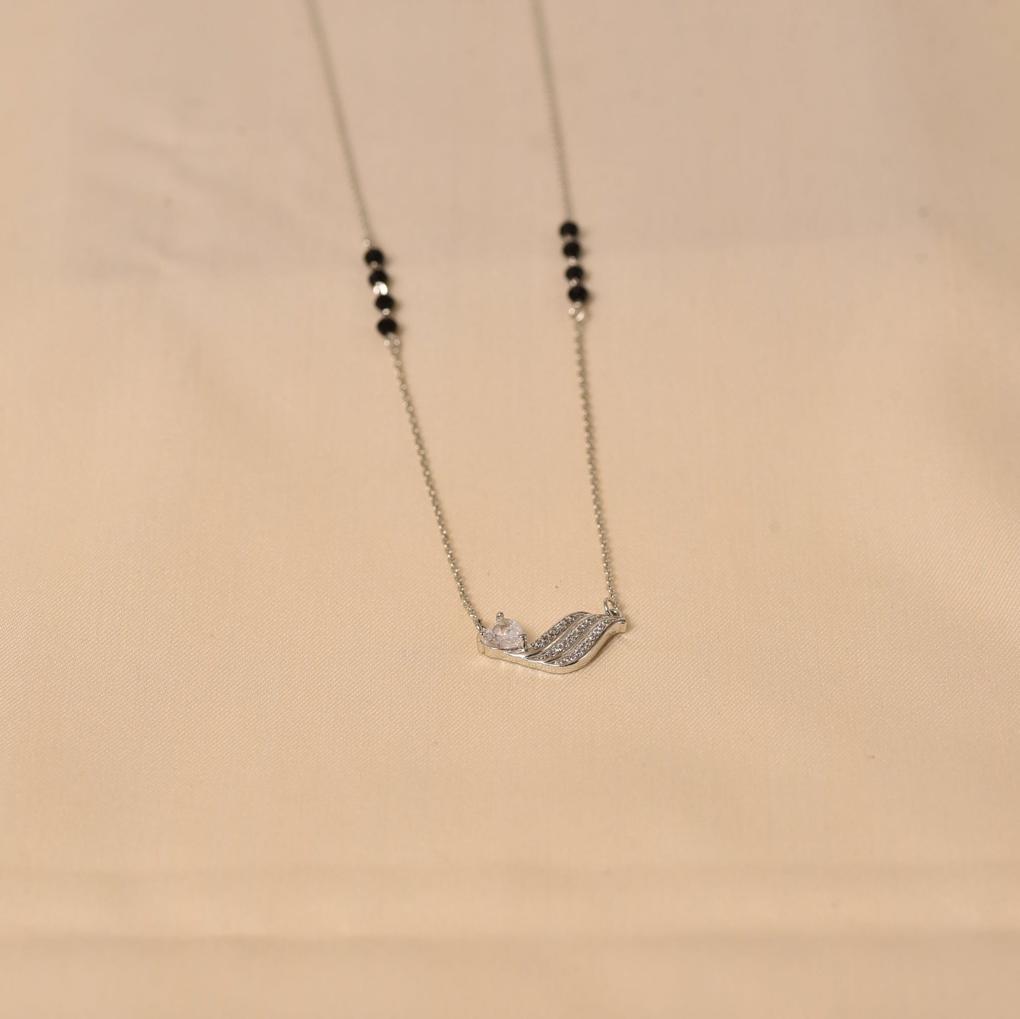 Black Bead Mangalsutra in Silver by Elyta